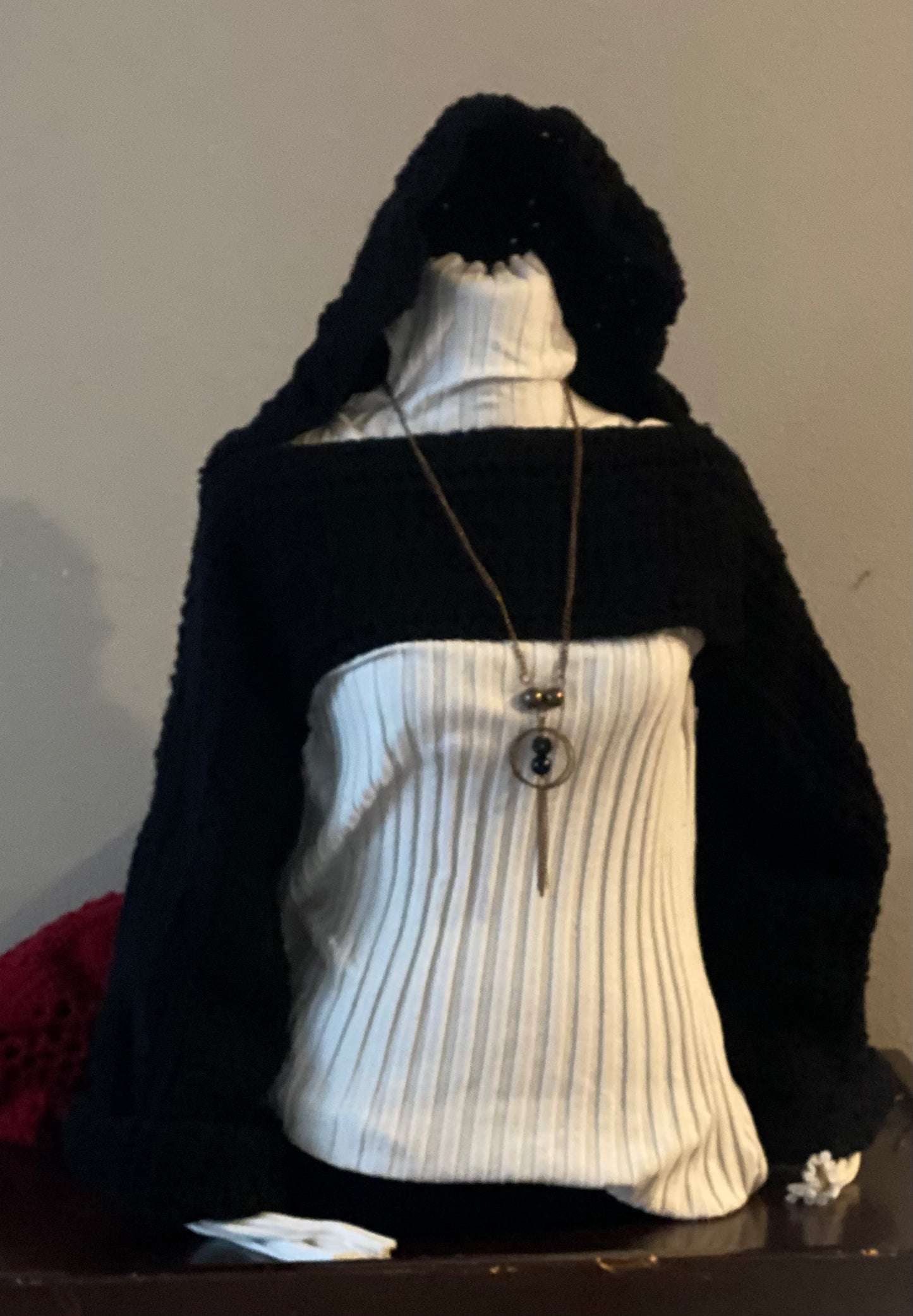 Black crochet crop top with hood